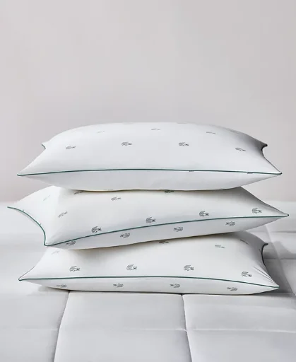 Lacoste Home All Over Crocs 20" x 28" Medium Density Cotton Pillow (Standard/Queen) Deal